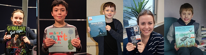 Children holding books.